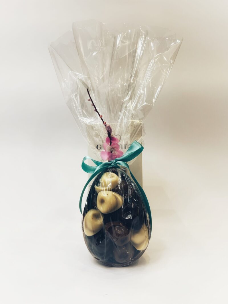 MILK CHOCOLATE HALF EGG FILLED WITH TORTELLINI